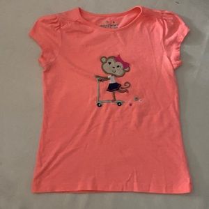 Little girls bright coral money shirt